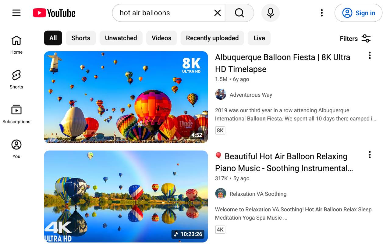 YouTube search results in full color.
